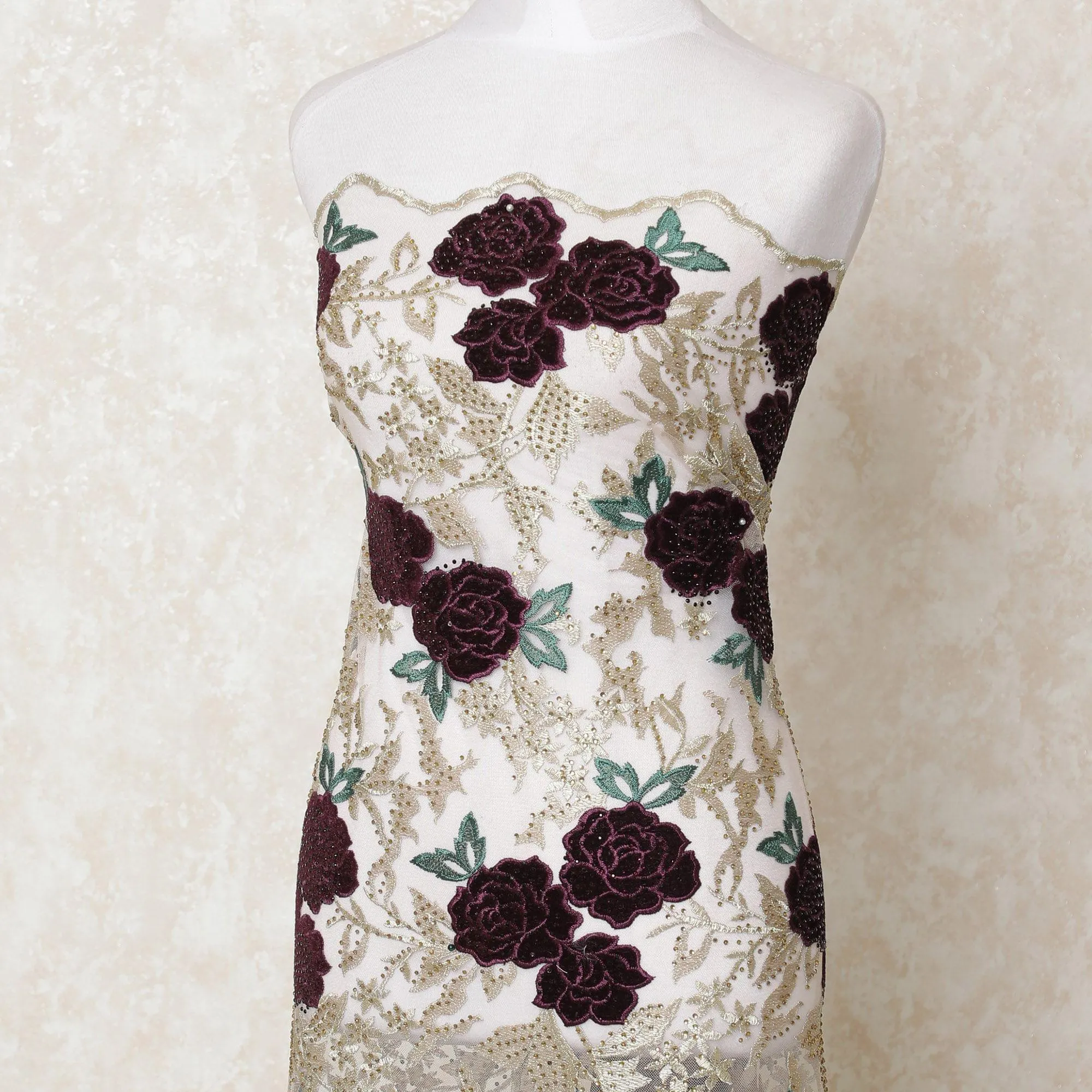 Beige nylon tulle fabric with gold, green and purple embroidery having stone work in floral design-D11818